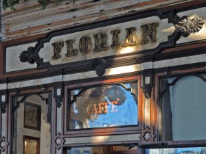 Elegany front door of Caffe Florian historic coffee shop in Venice, Italy in Piazza San Marco
