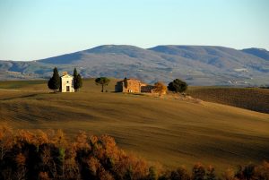 Beautiful panorama of Tuscan landscape in Val d'Orcia region south of Siena, pretty autumn colors. 